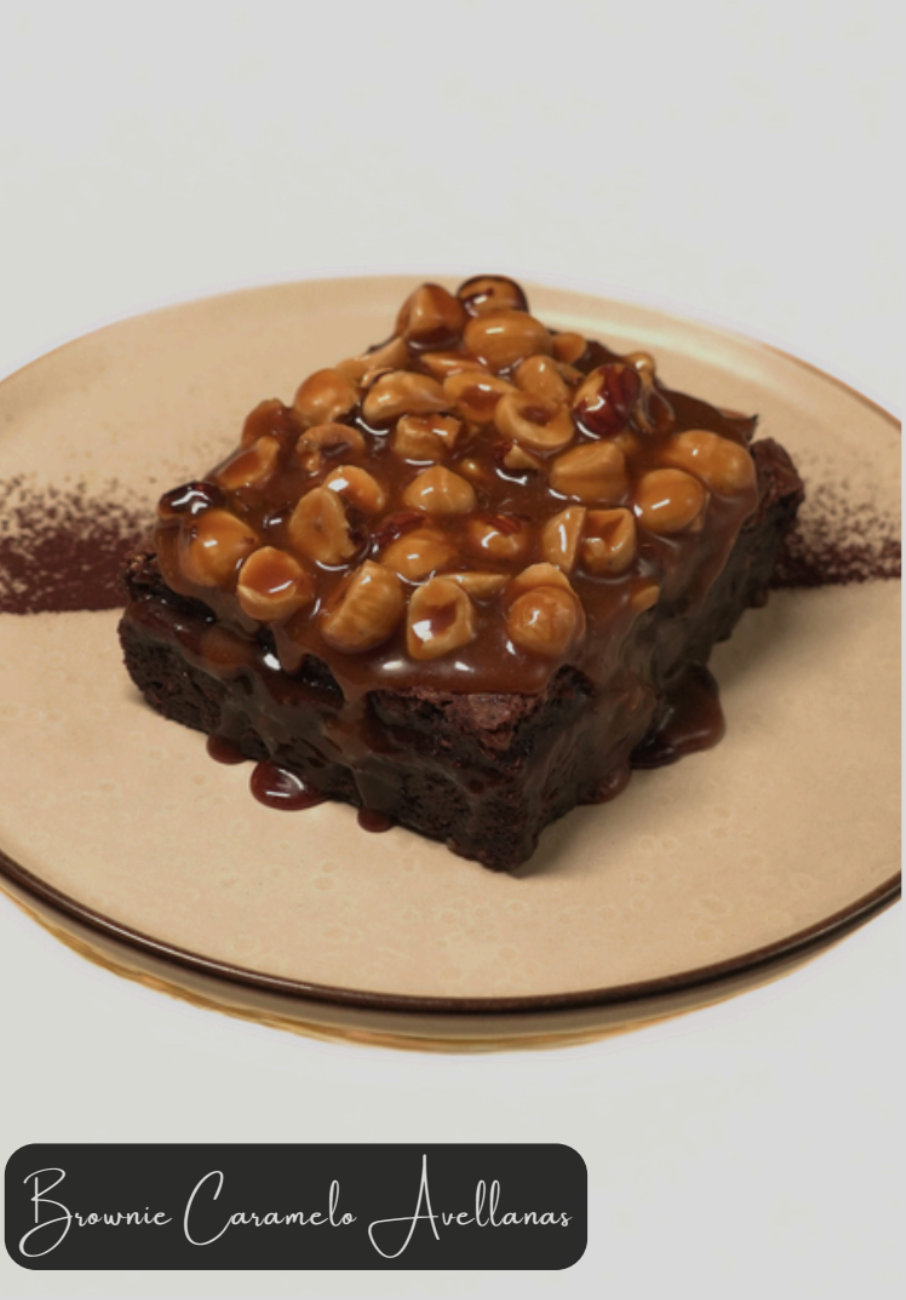 Chocolate brownie with caramel and hazelnuts