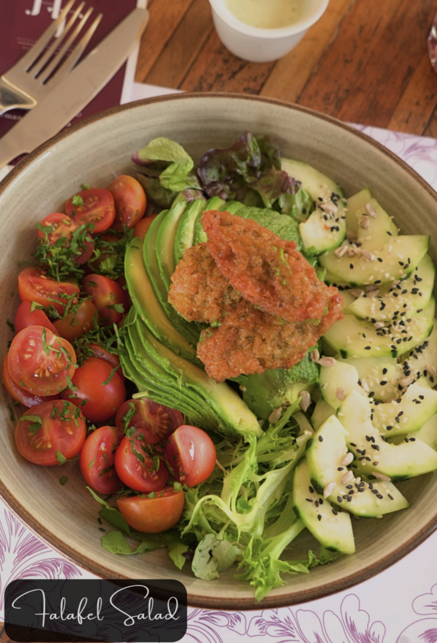 Fresh falafel salad with tomatoes and avocado