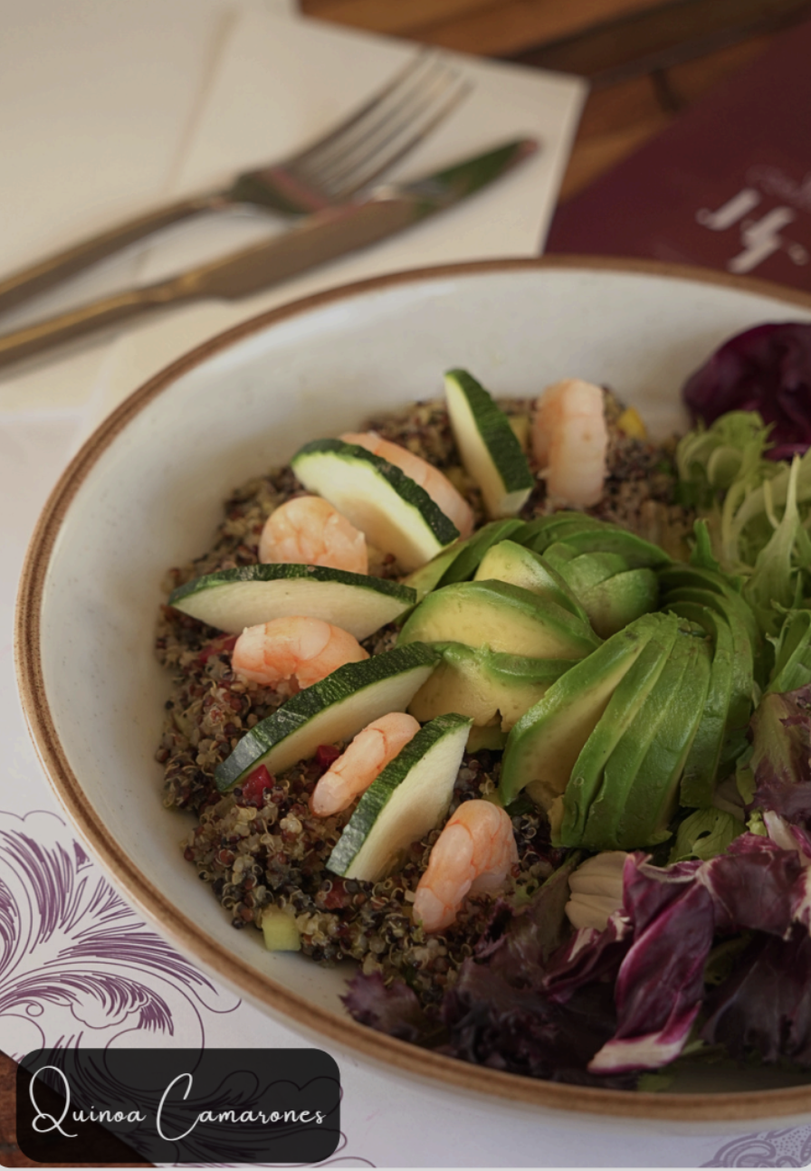 Quinoa salad with shrimp, avocado and mixed greens