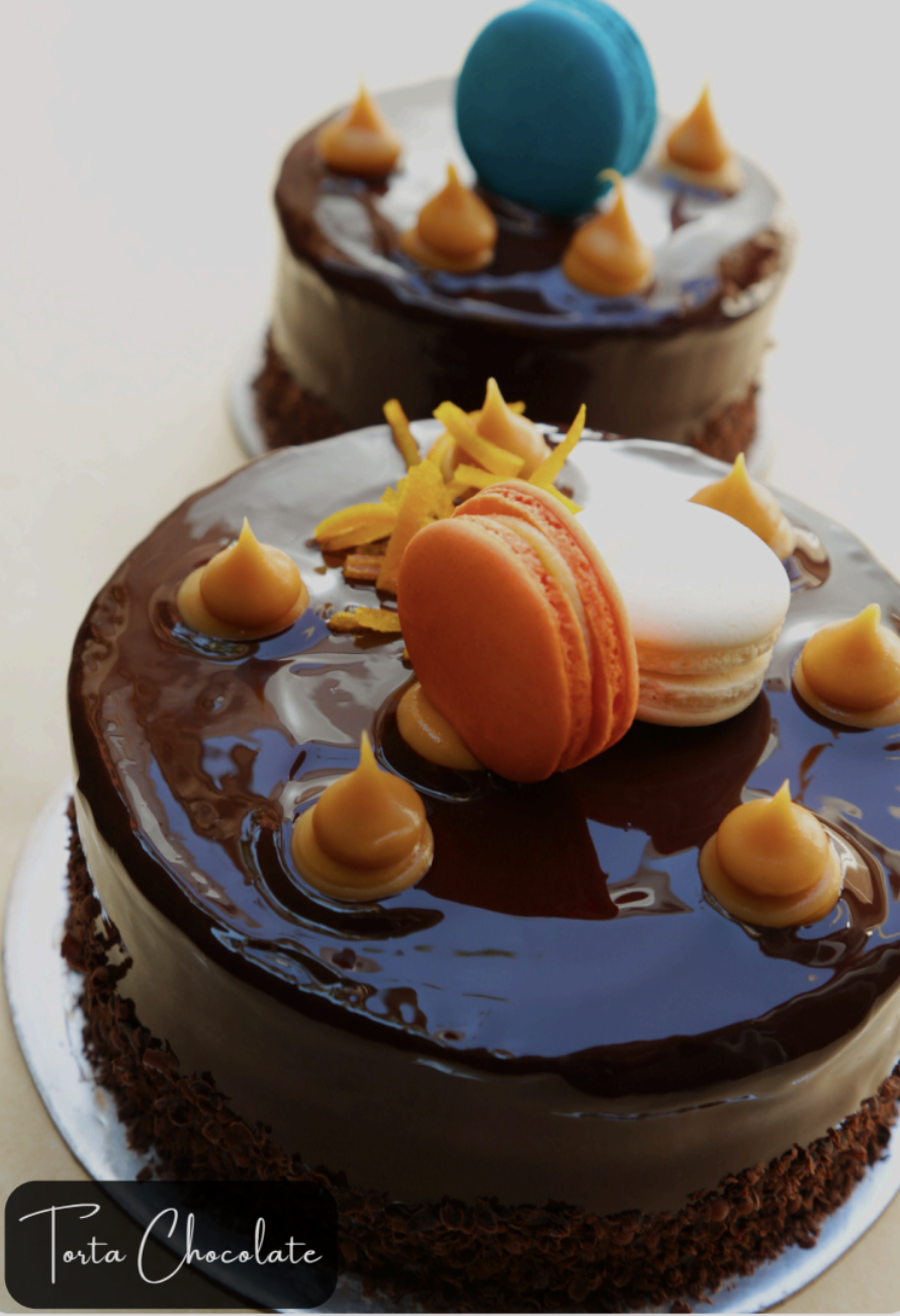 Elaborate chocolate cake with ganache and decorations